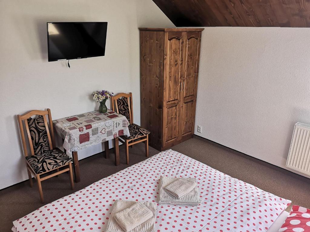 Postel nebo postele na pokoji v ubytování Privát Bachleda Ždiar