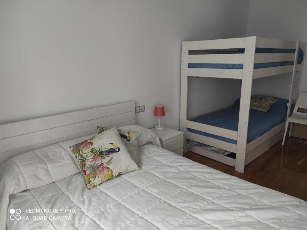 Postel nebo postele na pokoji v ubytování Brisalinda barreiros