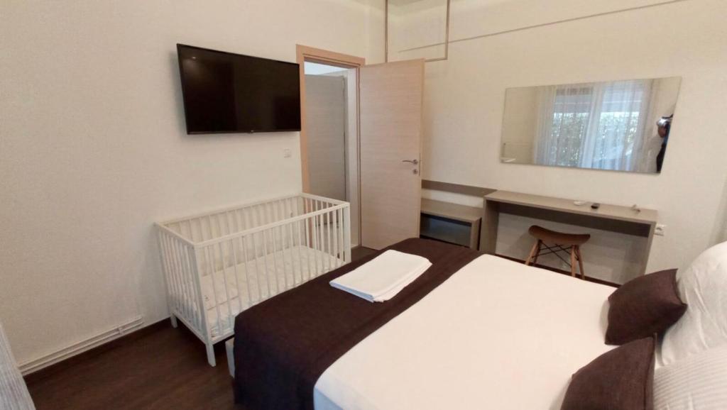 Posteľ alebo postele v izbe v ubytovaní EPaN Luxury Apartments
