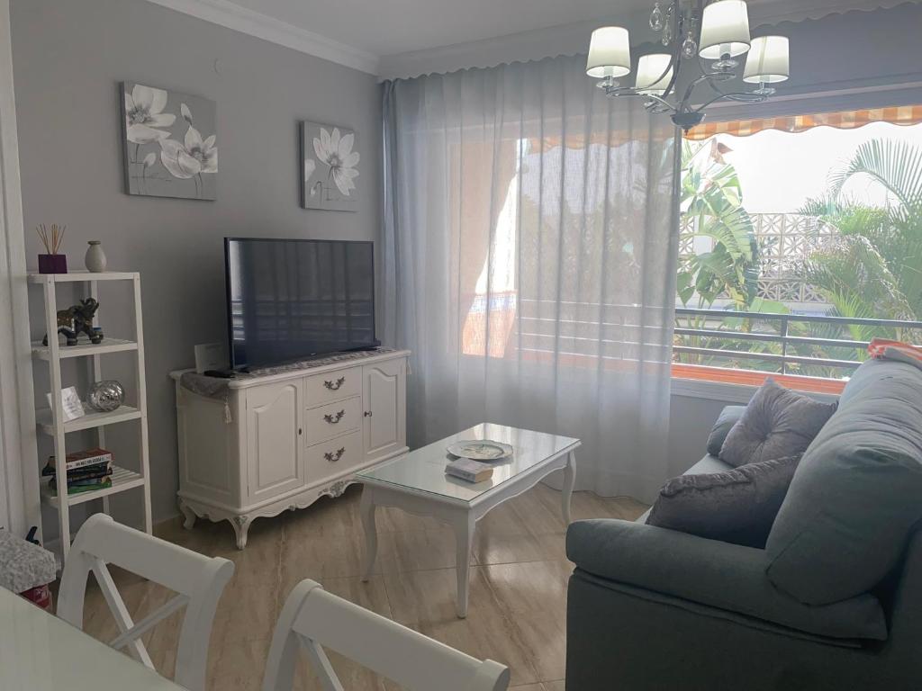 TV a/nebo společenská místnost v ubytování Perla Del Sol 1 l
