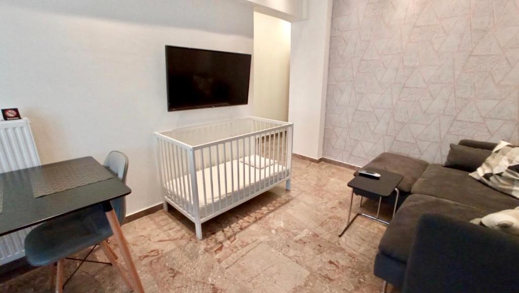 Televízia a/alebo spoločenská miestnosť v ubytovaní EPaN Luxury Apartments