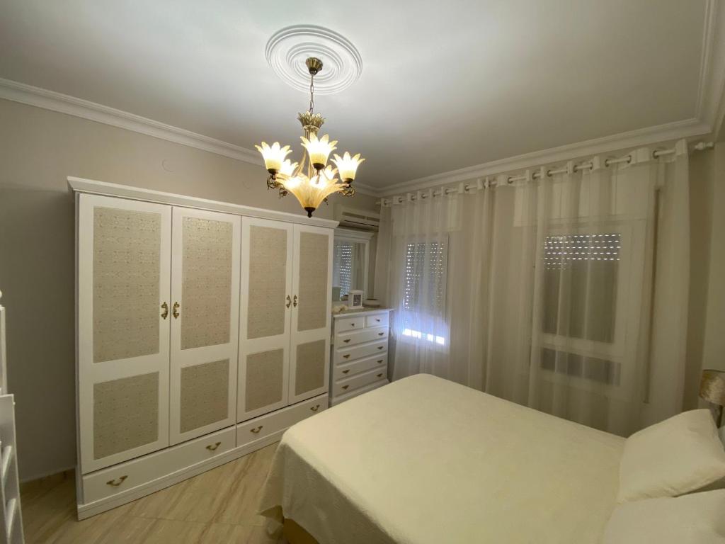 Postel nebo postele na pokoji v ubytování Perla Del Sol 1 l