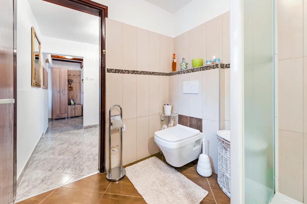 Postel nebo postele na pokoji v ubytování Apartment Pino