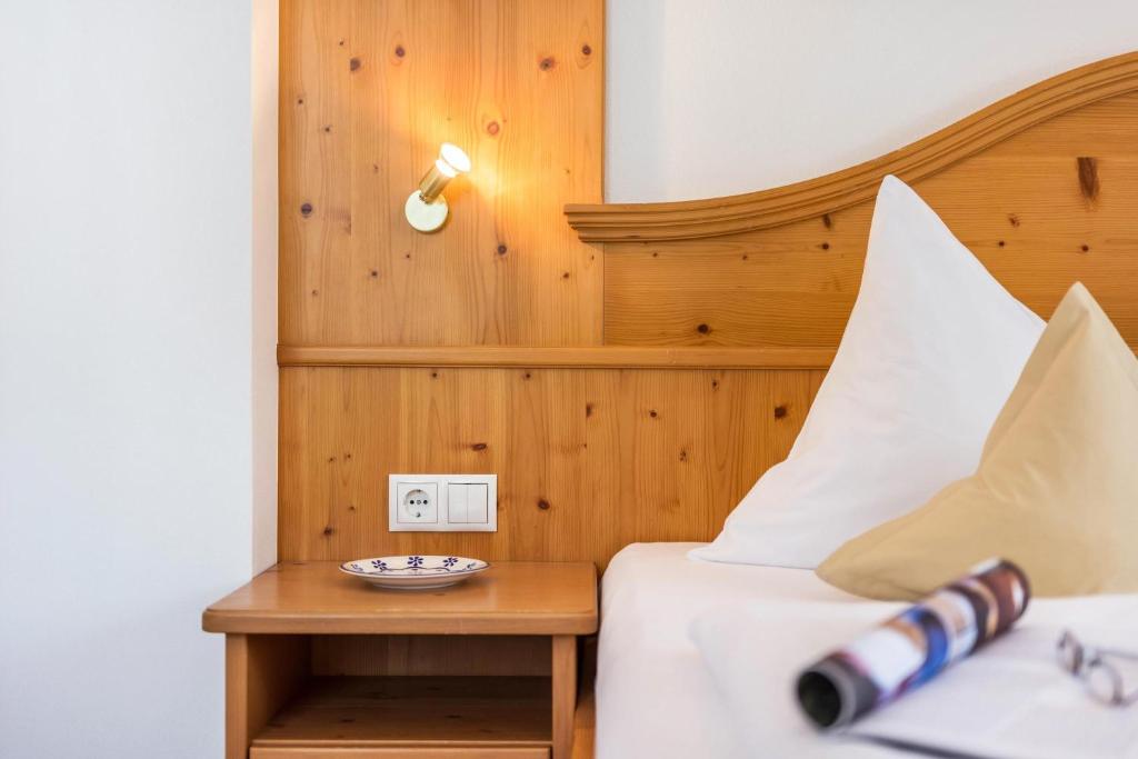 Postel nebo postele na pokoji v ubytování Kristiania Apartement Typ A2