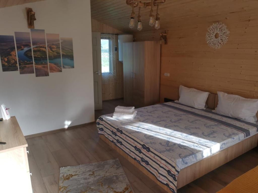 Postel nebo postele na pokoji v ubytování La 3 Casute