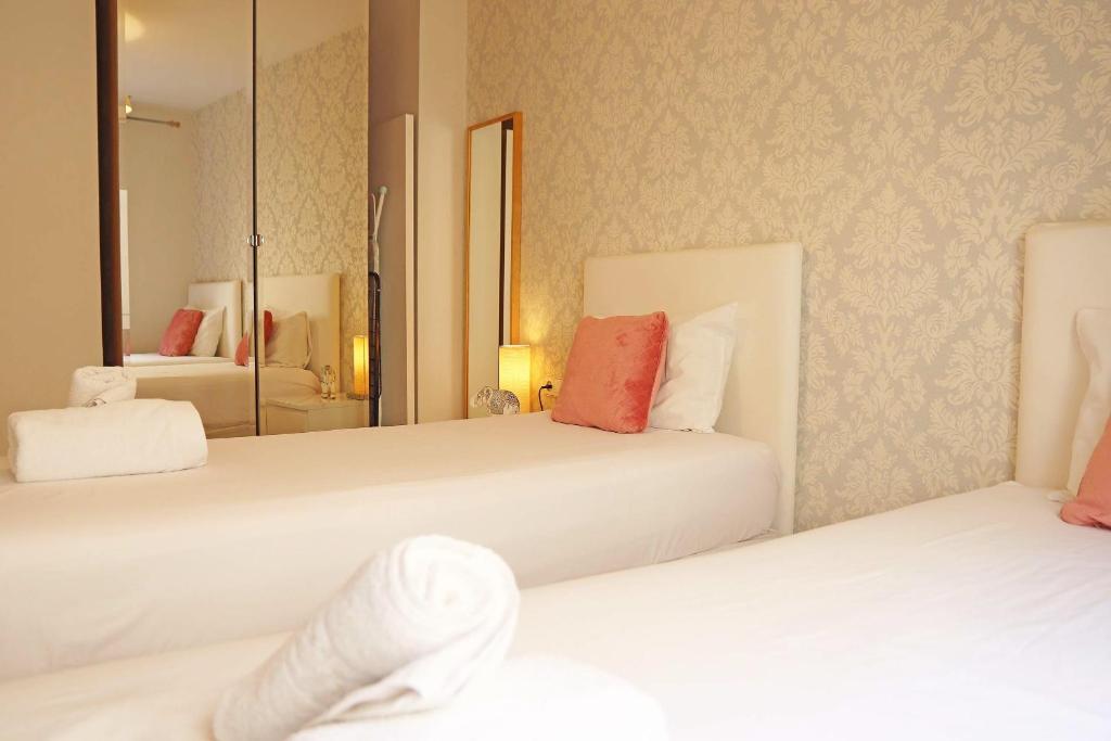 Posteľ alebo postele v izbe v ubytovaní Bcn-rentals apartments in the Old town