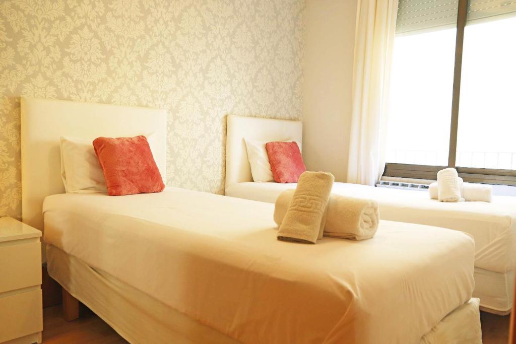 Posteľ alebo postele v izbe v ubytovaní Bcn-rentals apartments in the Old town