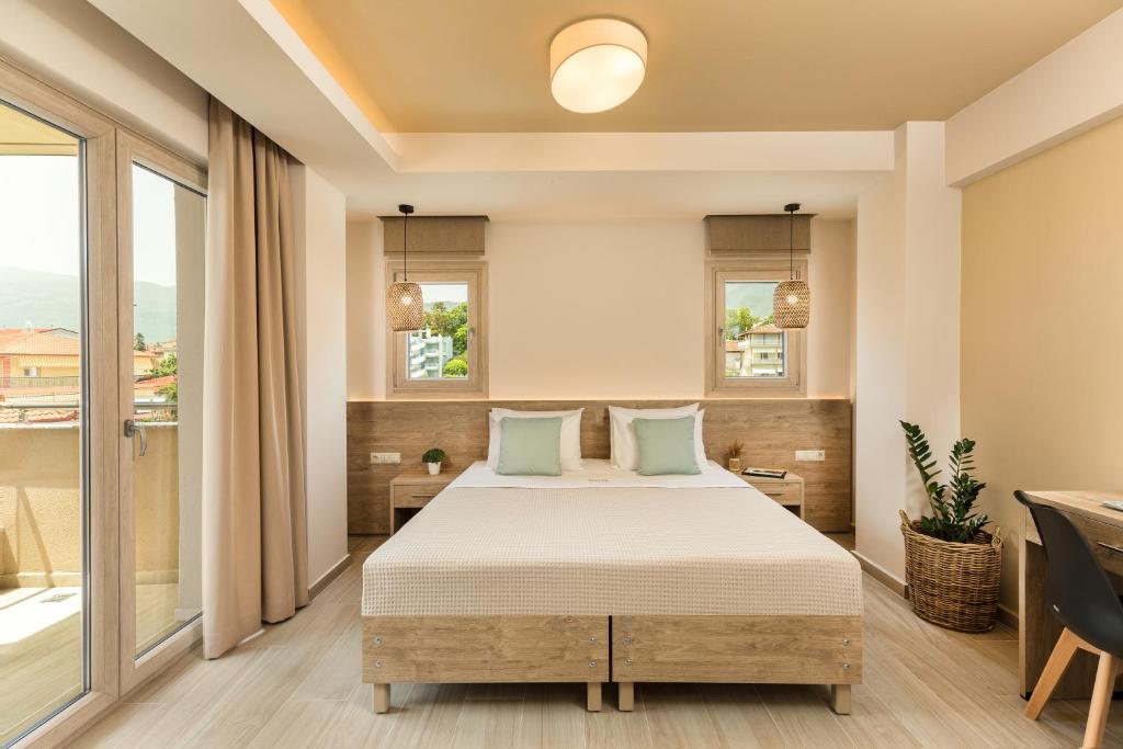Posteľ alebo postele v izbe v ubytovaní Makris Luxury Rooms