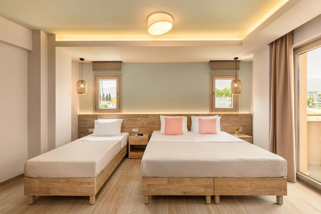 Posteľ alebo postele v izbe v ubytovaní Makris Luxury Rooms