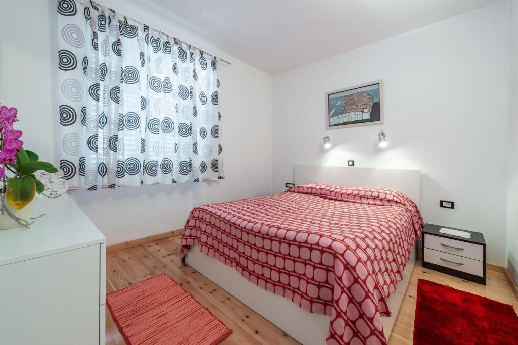Posteľ alebo postele v izbe v ubytovaní Apartment Giorgio