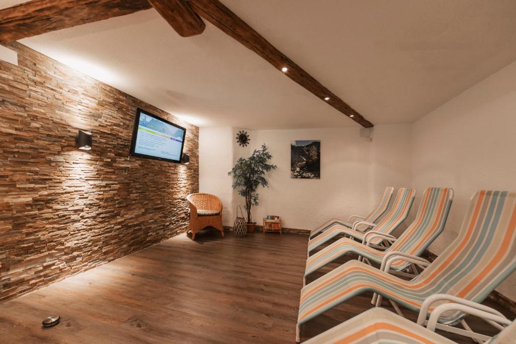 TV a/nebo společenská místnost v ubytování Alpenhof