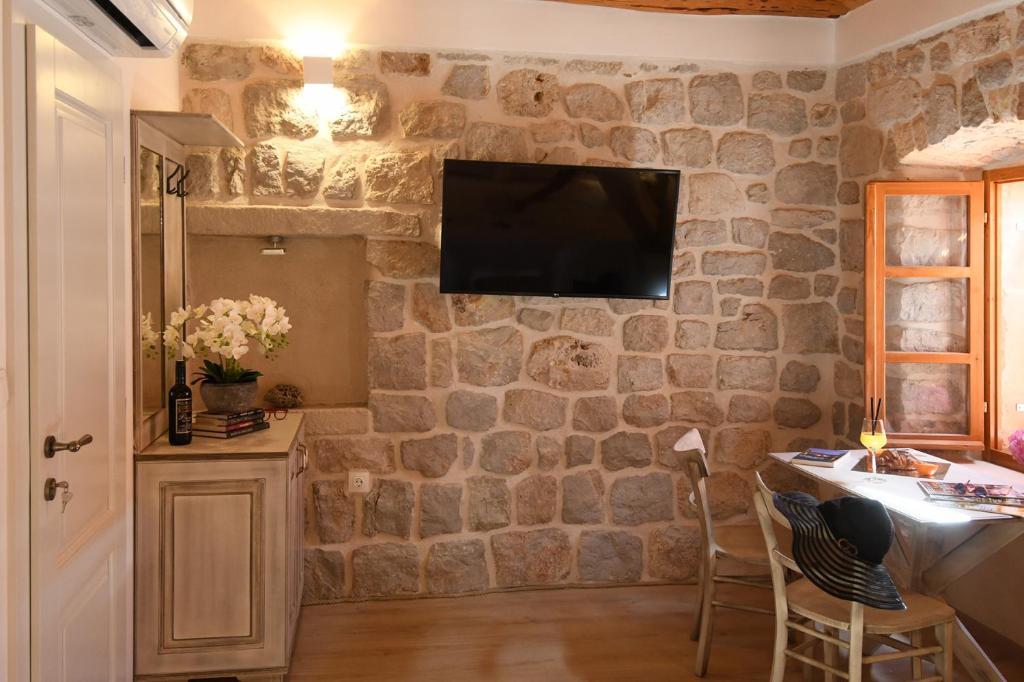 Televízia a/alebo spoločenská miestnosť v ubytovaní Dubrovnik Throne Suite IV