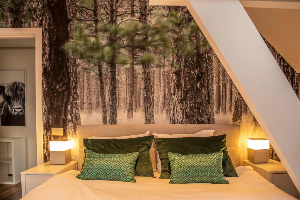 Ένα ή περισσότερα κρεβάτια σε δωμάτιο στο Beautiful city center apartments in Ghent near medieval castle