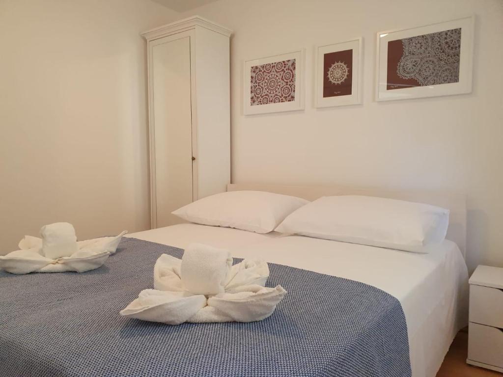 Cama o camas de una habitación en Apartman Garden Novalja
