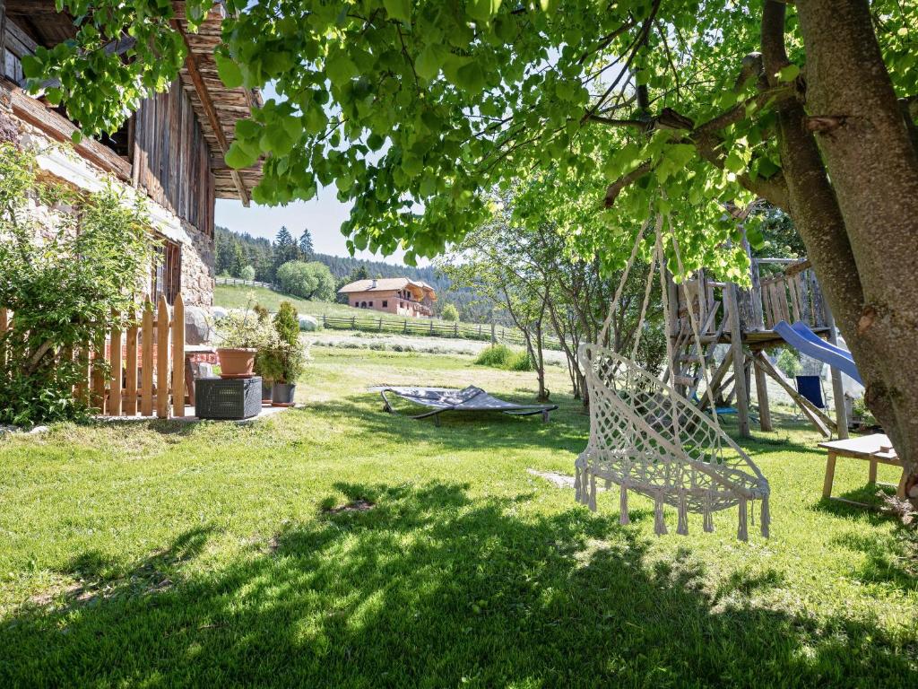 A garden outside Huanzhof Ferienwohnung Weißhorn