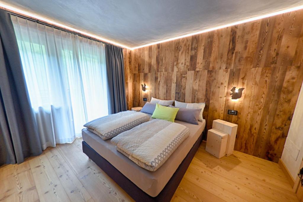 Postel nebo postele na pokoji v ubytování Chrys b&b