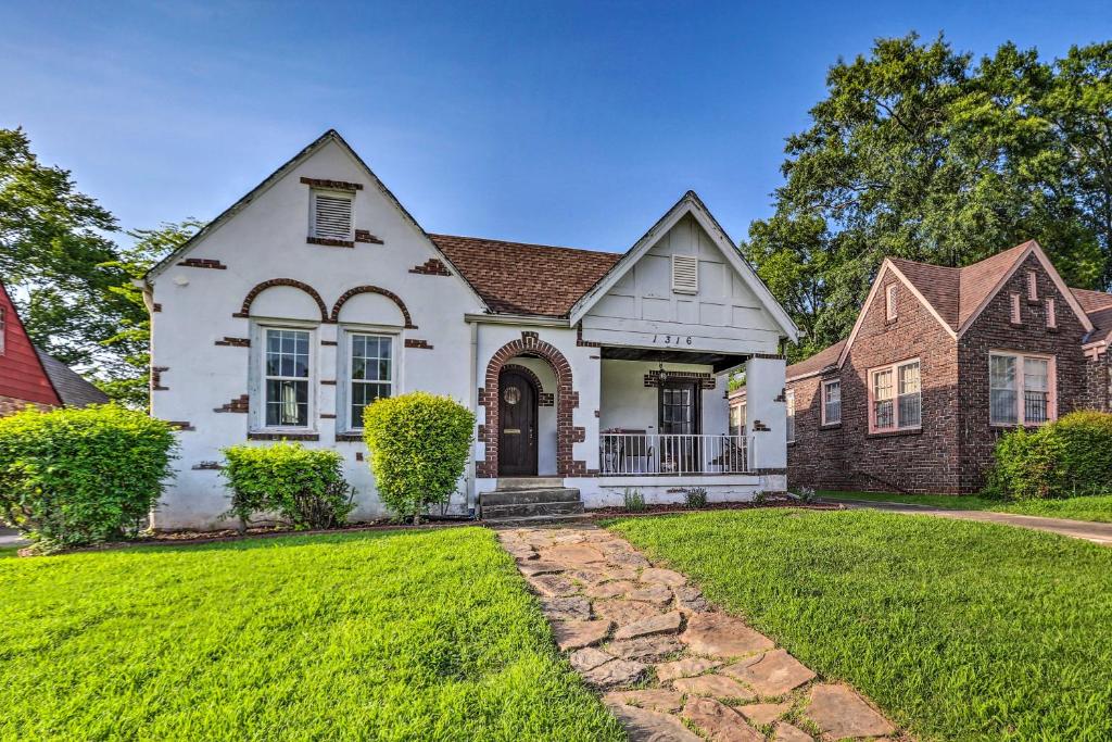 a house with a green lawn at Cozy Birmingham Abode Less Than 7 Mi to Downtown Fun! in Birmingham