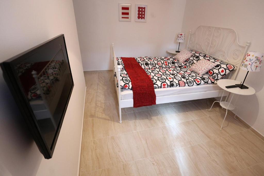 TV a/nebo společenská místnost v ubytování Guesthouse Villa Maggie