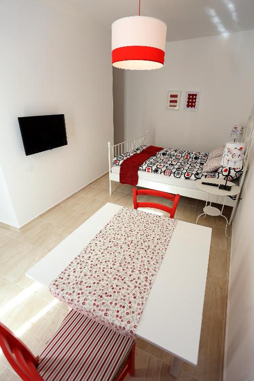 TV a/nebo společenská místnost v ubytování Guesthouse Villa Maggie