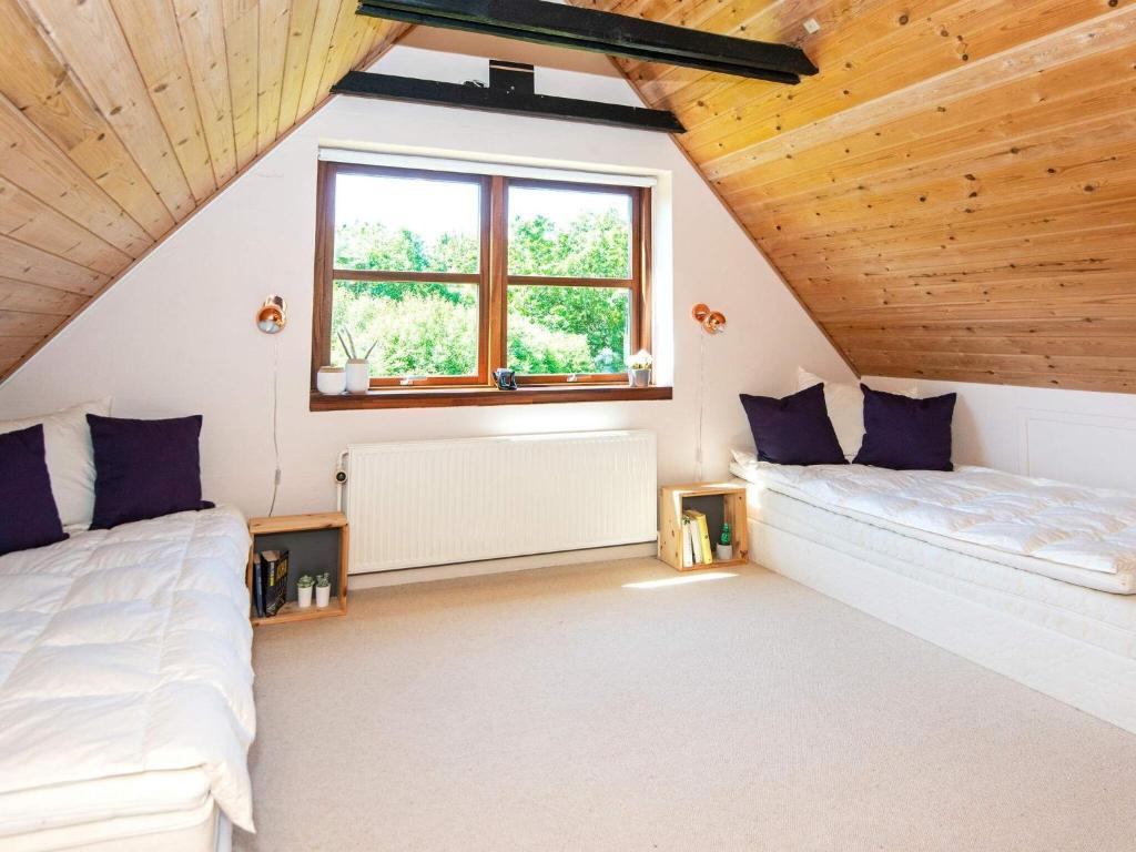 Postel nebo postele na pokoji v ubytování Holiday home Aars