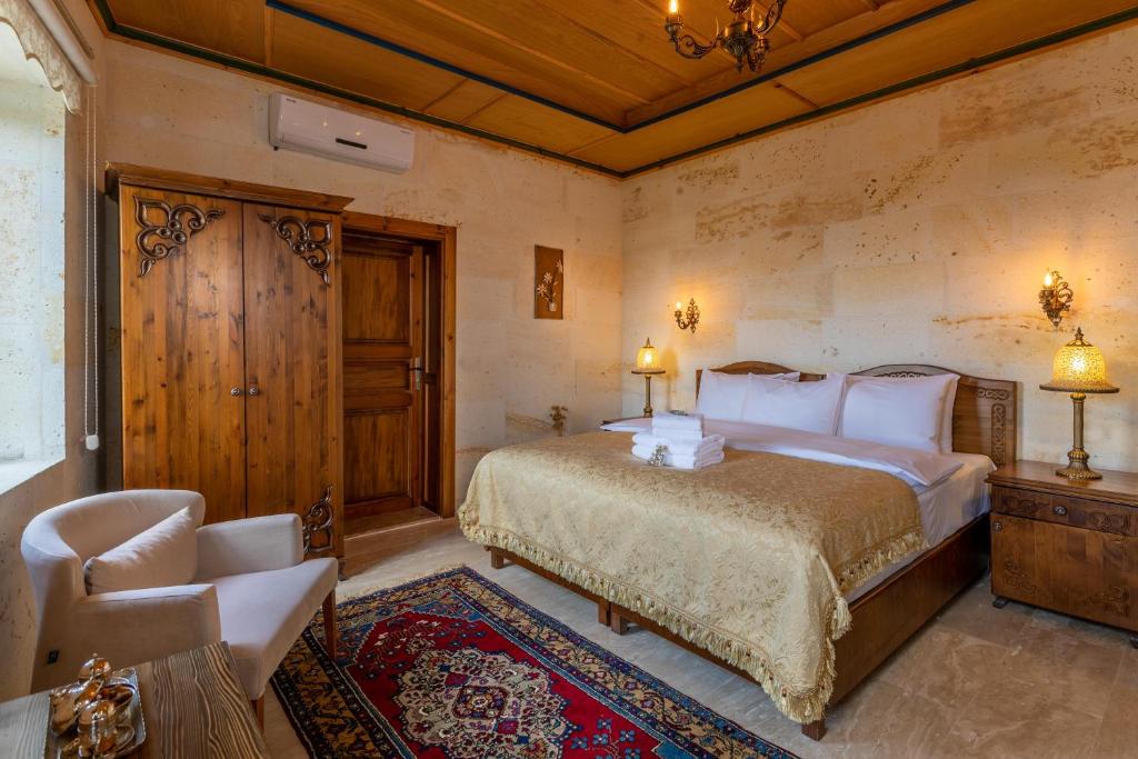 Postel nebo postele na pokoji v ubytování Esens Stone House