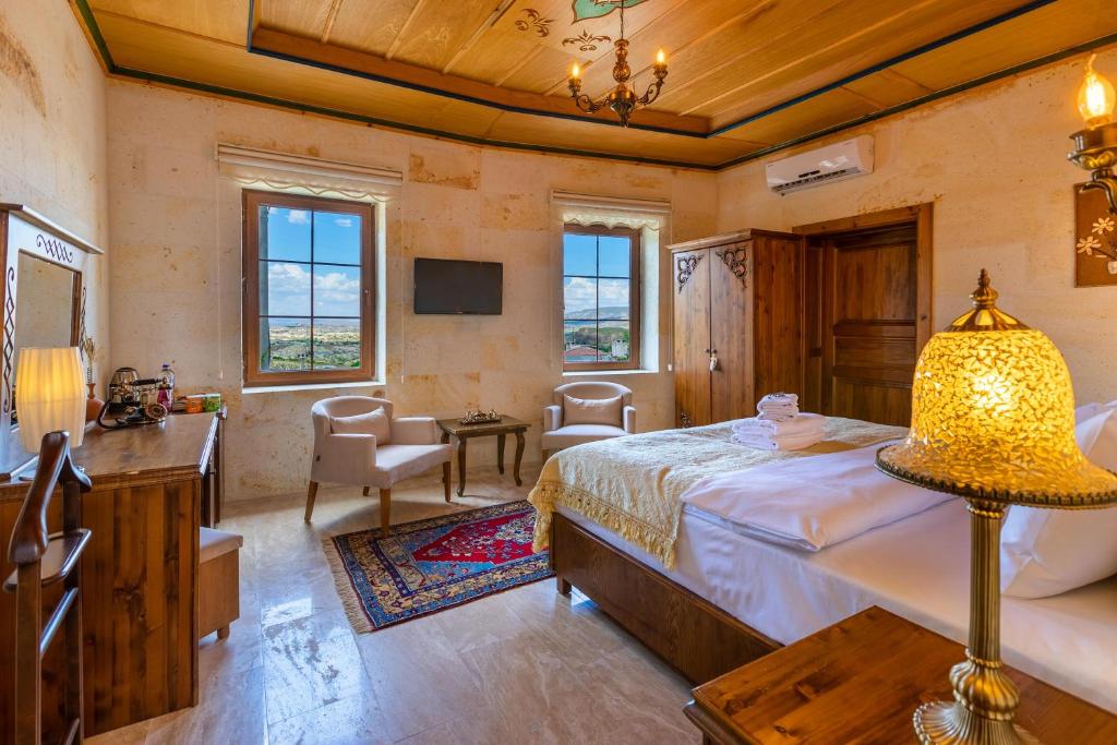 Postel nebo postele na pokoji v ubytování Esens Stone House