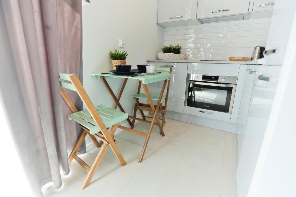 Kuchyňa alebo kuchynka v ubytovaní M&K Apartamenty - Morska Przystań