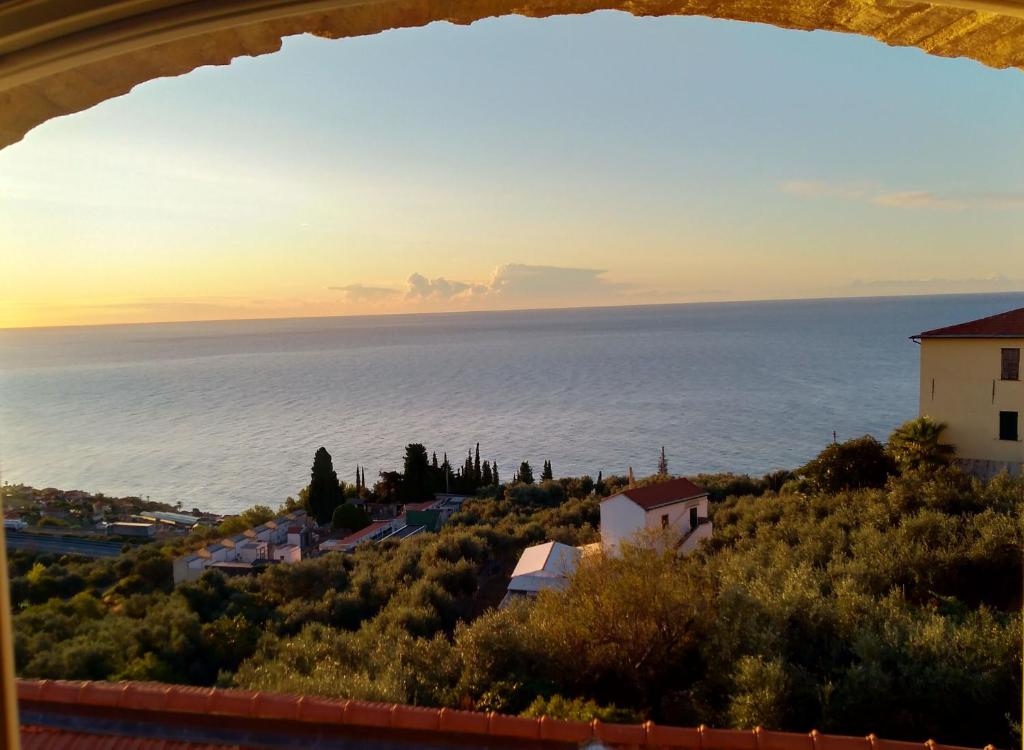 a view of the ocean from a building at Albachiara home - vista mare in Cipressa