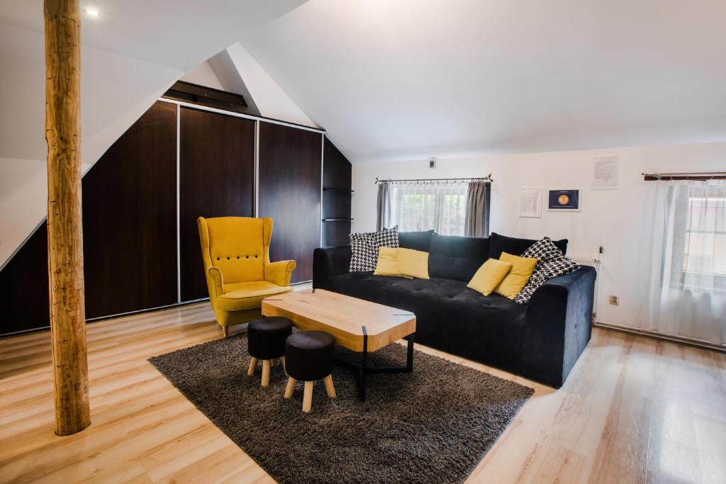 Posedenie v ubytovaní Dwupiętrowy Apartament Grota 2