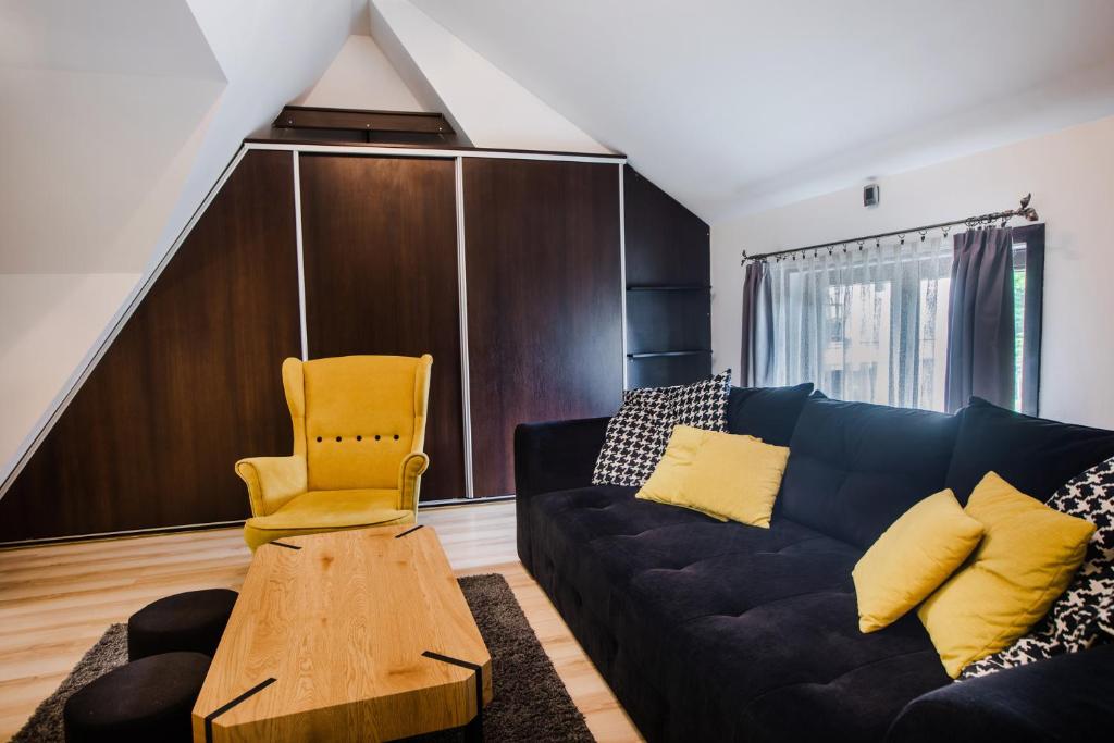 Posedenie v ubytovaní Dwupiętrowy Apartament Grota 2