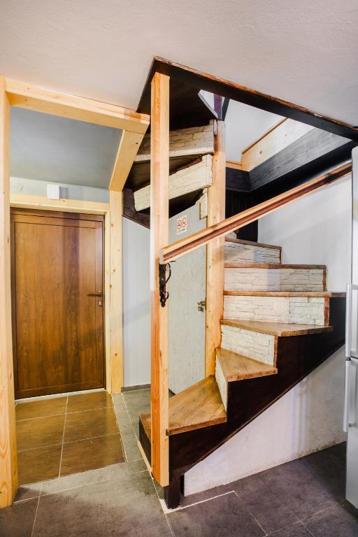 Posteľ alebo postele v izbe v ubytovaní Dwupiętrowy Apartament Grota 2