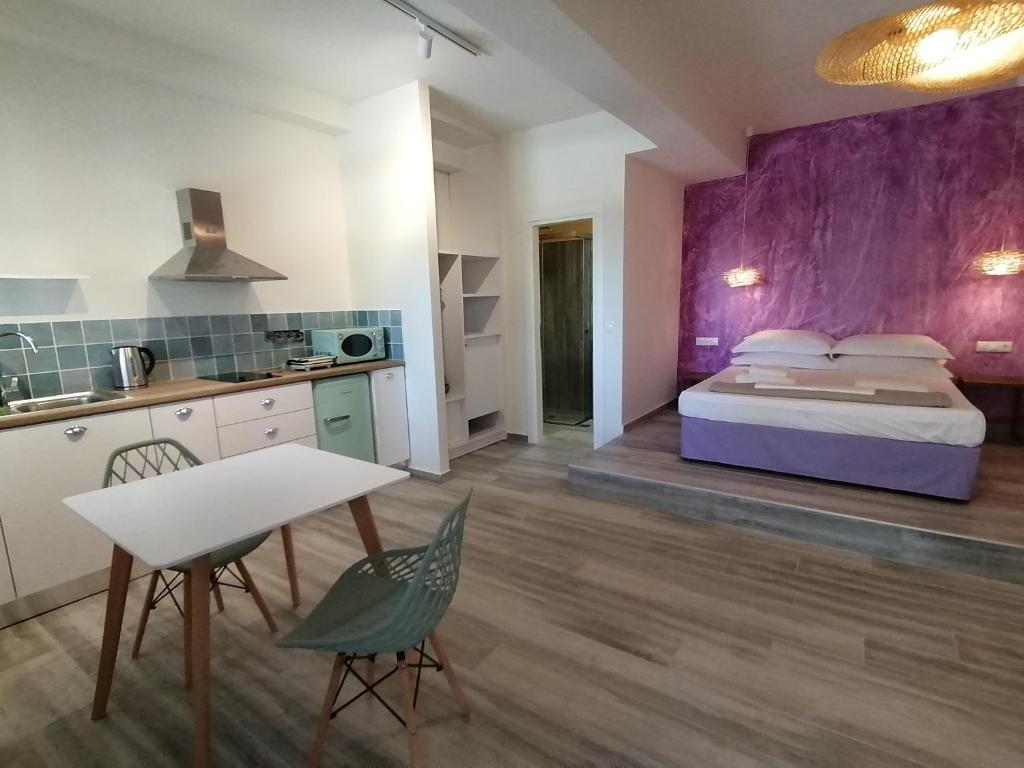 Postel nebo postele na pokoji v ubytování Villa Nena - Studio Suites