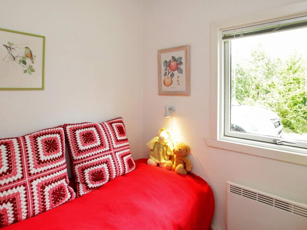 Postel nebo postele na pokoji v ubytování Holiday home Hals IX