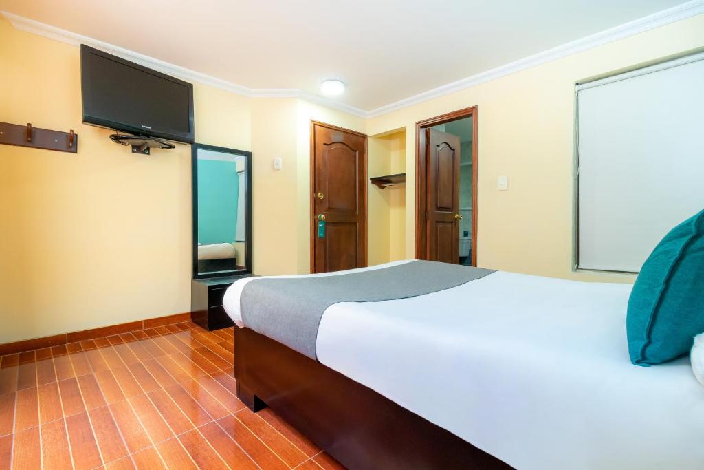 Postel nebo postele na pokoji v ubytování Hotel Ayenda Normandy