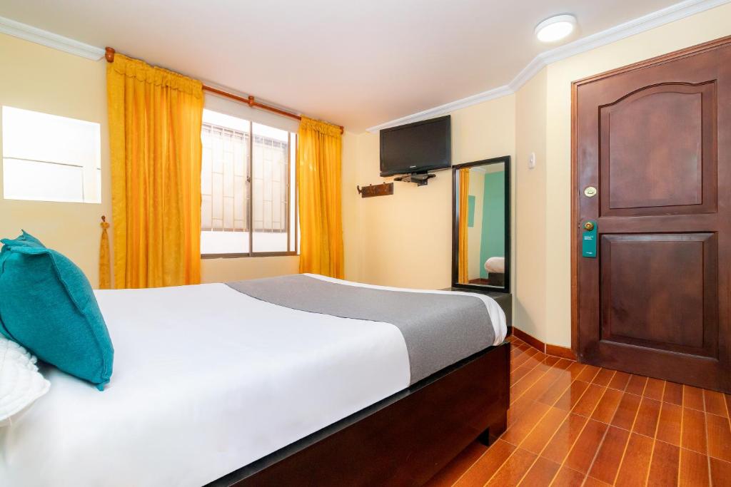 Postel nebo postele na pokoji v ubytování Hotel Ayenda Normandy
