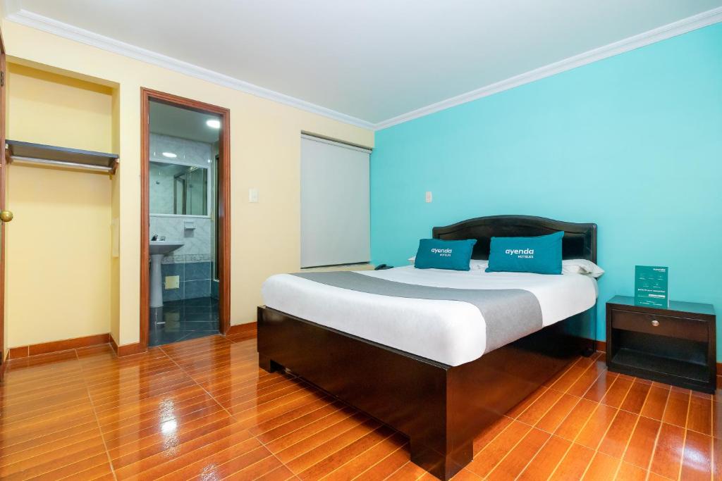 Postel nebo postele na pokoji v ubytování Hotel Ayenda Normandy