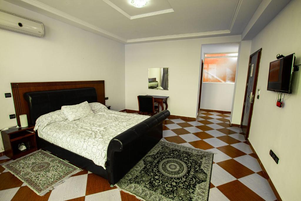 Postel nebo postele na pokoji v ubytování Motel Gzenaya