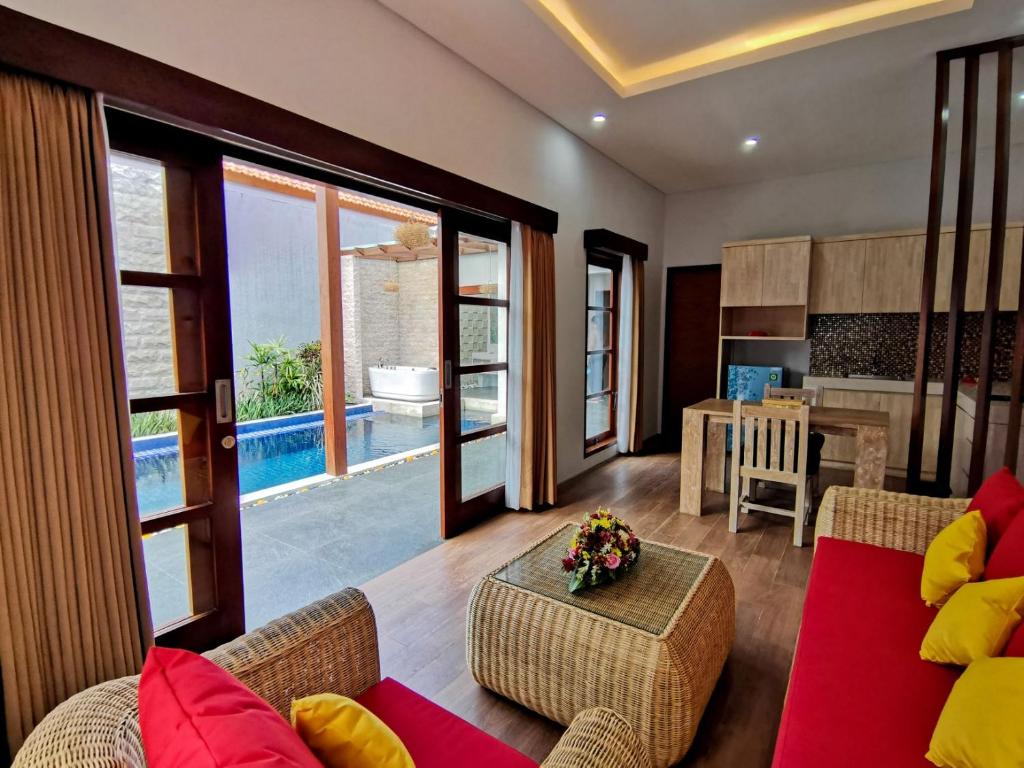 Posezení v ubytování Kuta Puri Bungalows, Villas and Resort