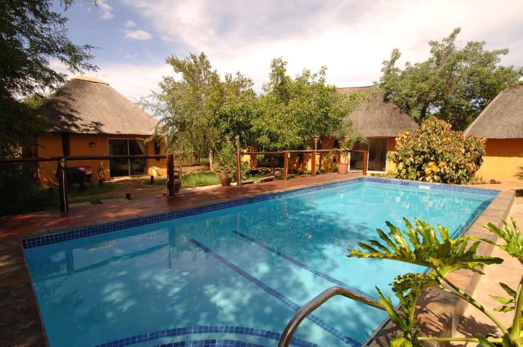 The swimming pool at or close to Normann Safari Bush Lodge