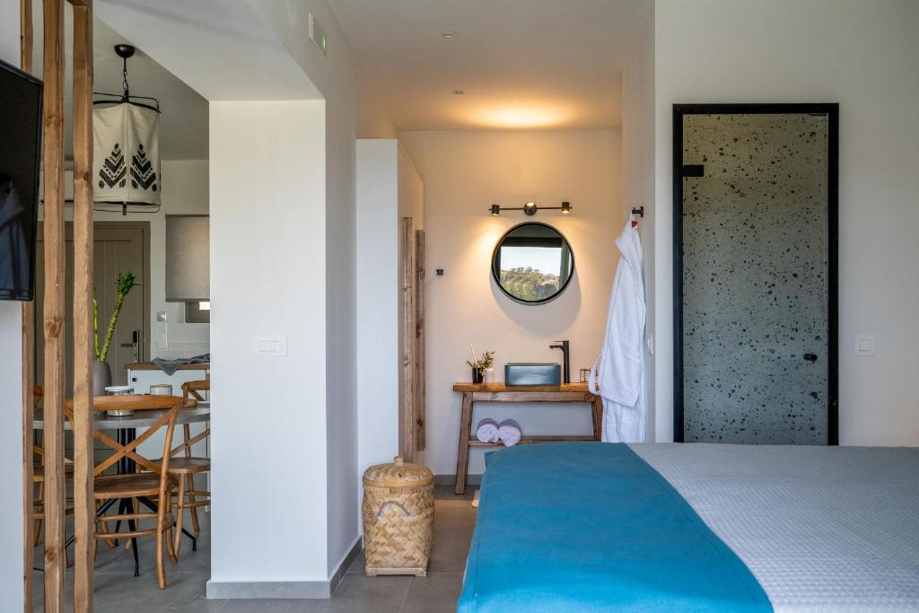Postel nebo postele na pokoji v ubytování Pignolia Suites - Adults Only