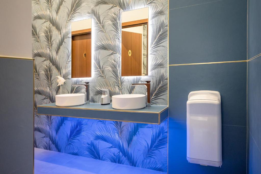 Koupelna v ubytování Hotel Coralba