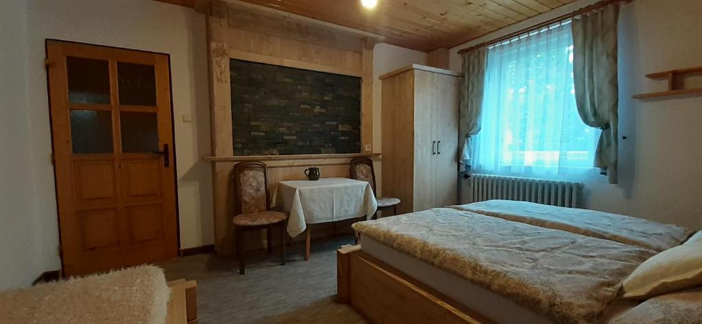 Postel nebo postele na pokoji v ubytování Apartmán Astra v Ždiari