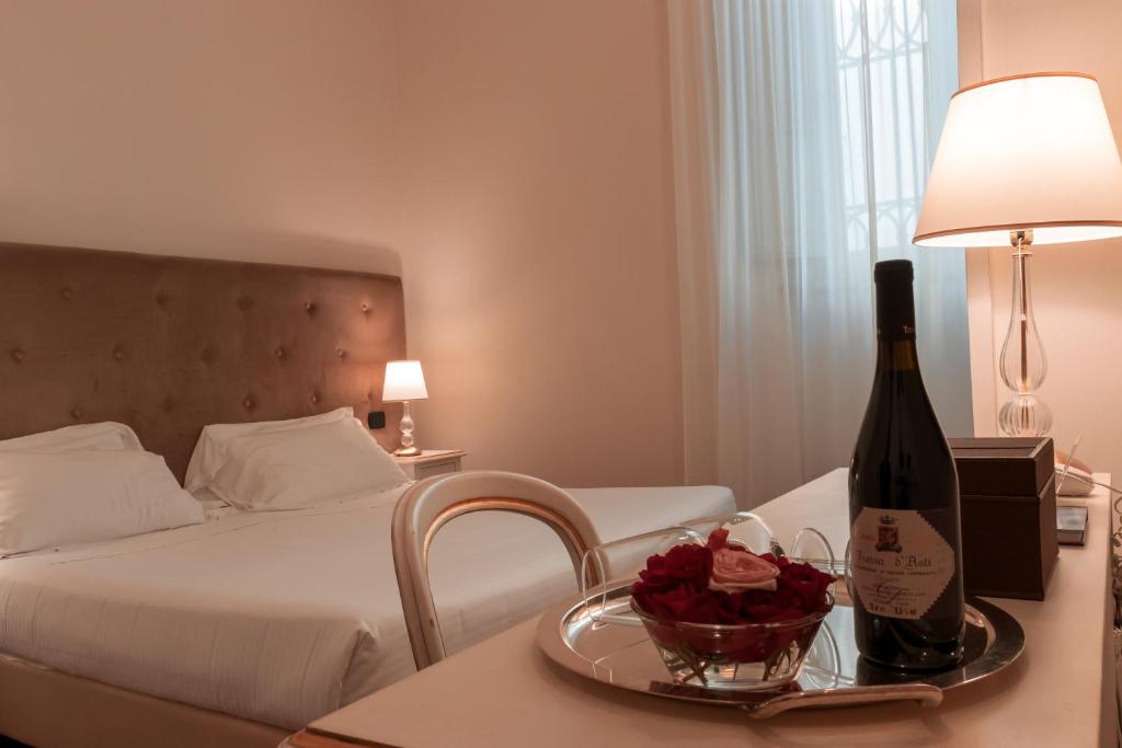 A bed or beds in a room at Palazzo Galletti Abbiosi