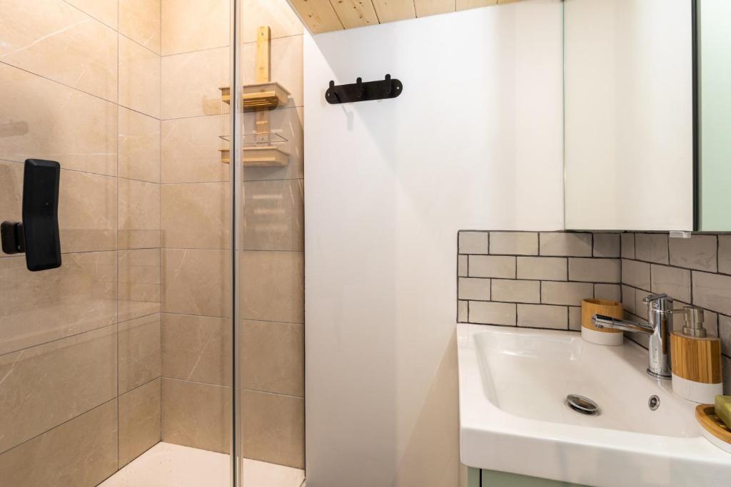 a bathroom with a shower and a sink at DIFY Joseph Bonnet - Croix Rousse in Lyon