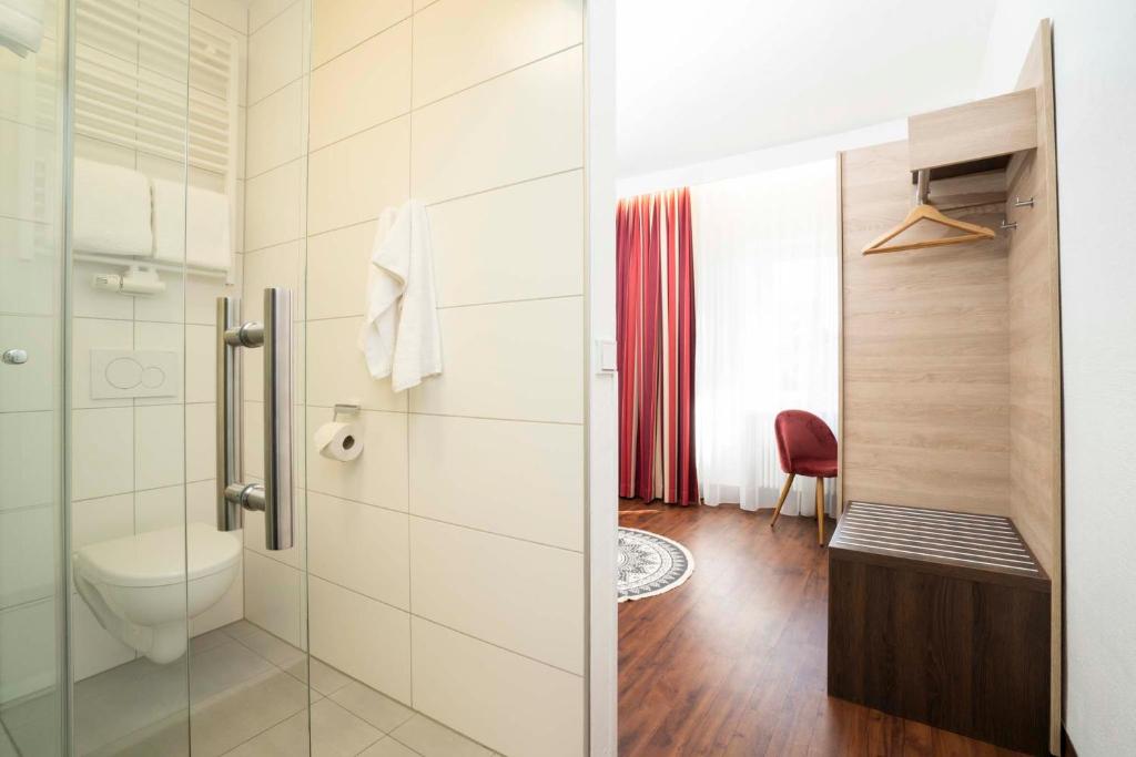 Koupelna v ubytování Hotel National