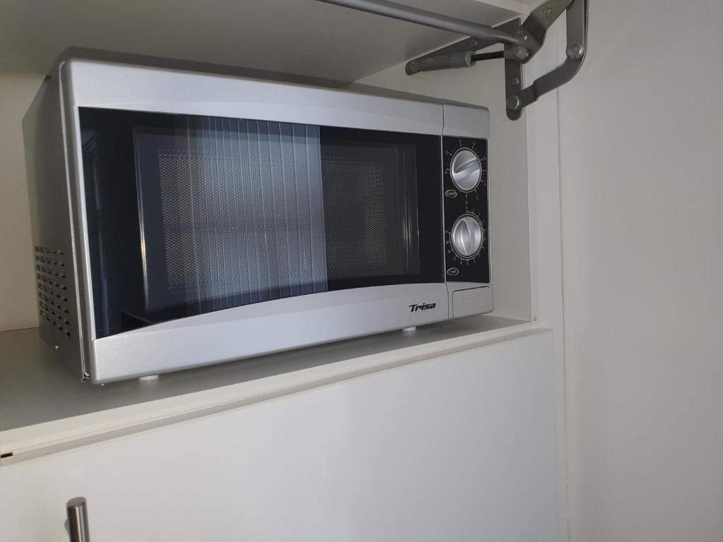 Kuchyň nebo kuchyňský kout v ubytování Schönes Studio in Arbon am Bodensee Neu Klimatisiert !