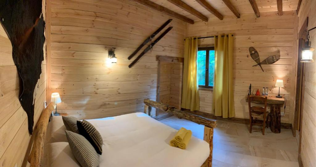 Cama o camas de una habitación en La Posada Cercedilla