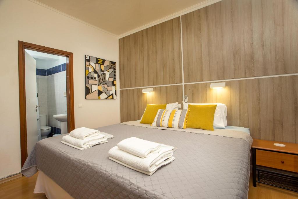Posteľ alebo postele v izbe v ubytovaní Rea Hotel