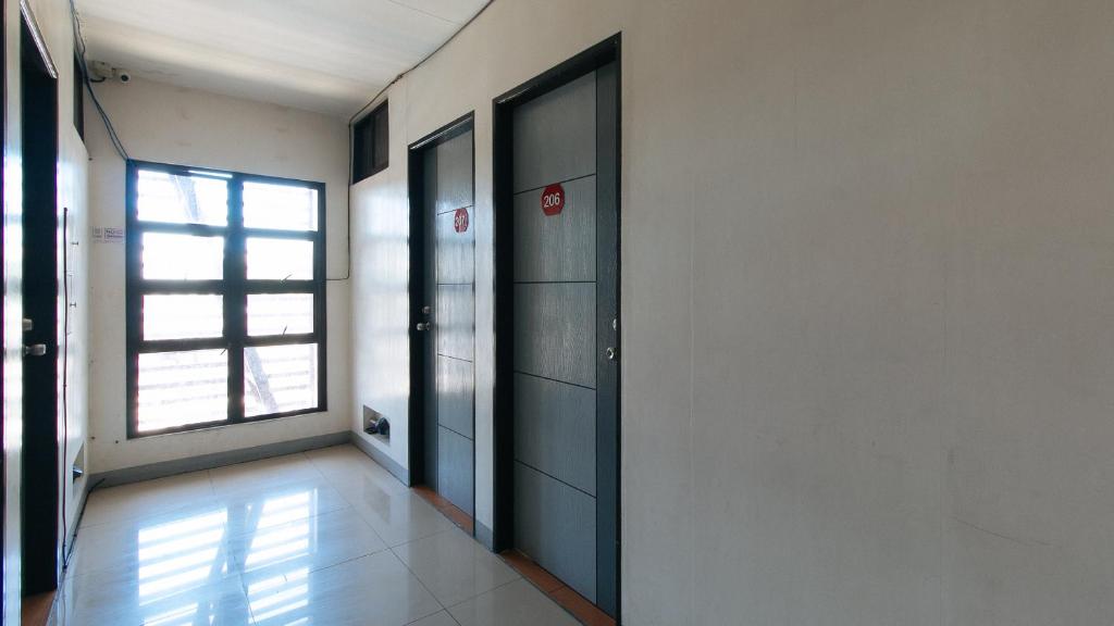 Fotografie z fotogalerie ubytování RedDoorz at CAA Road Las Pinas v destinaci Manila