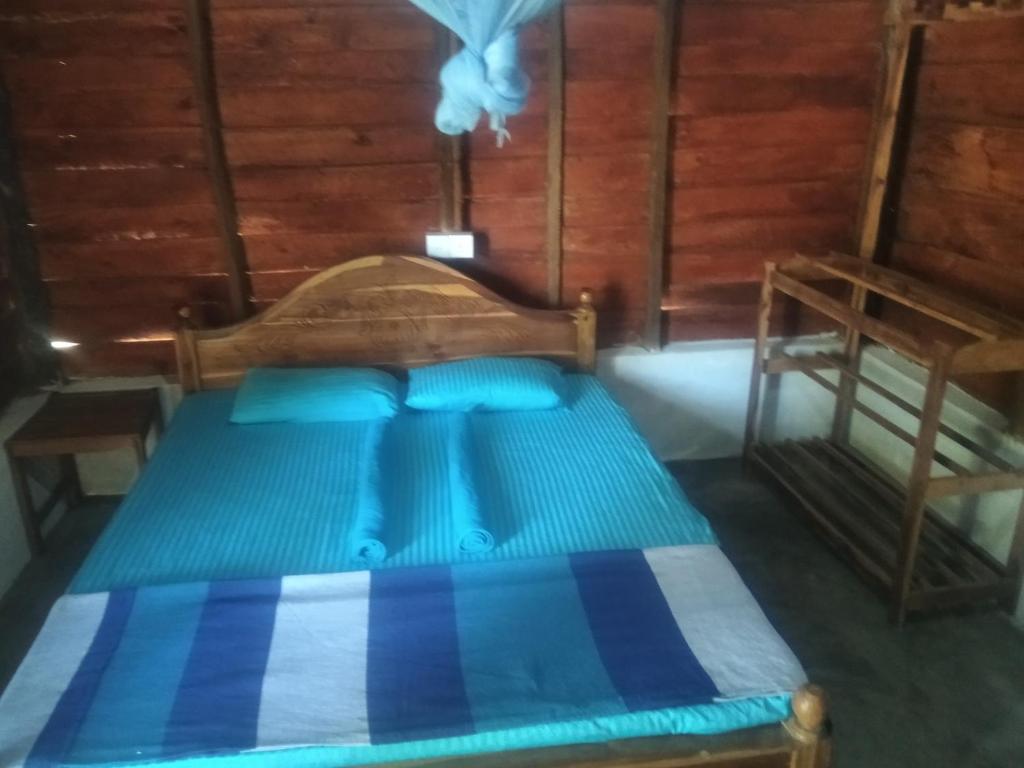 Postel nebo postele na pokoji v ubytování araliya villa